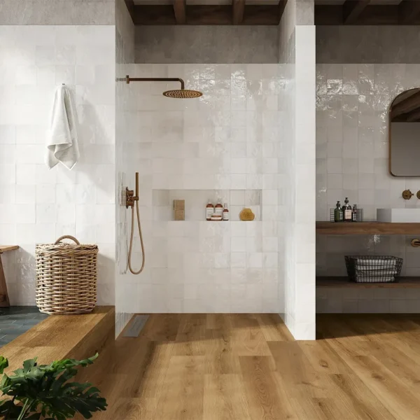 Handmade tile manufacturers catalogue´s picture showing a beautiful bathroom area decorated with artisanal tiles 