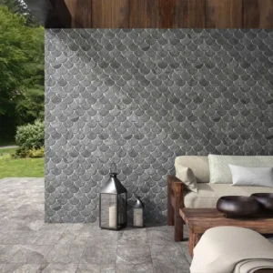 Mosaic tiles set on the wall of a garden area 