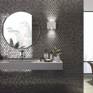 Bathroom wall coated with stylish grey mosaic tiles 