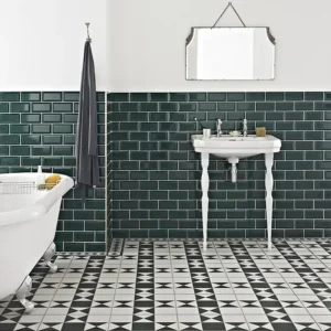 Subway tile manufacturers catalogue´s picture  showing a stylish bathroom coated with dark green subway tiles 